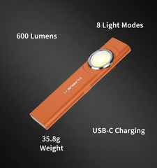 Orange flashlight with features highlighted on a dark background