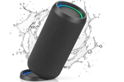 Black Bluetooth speaker with water splashes on a white background